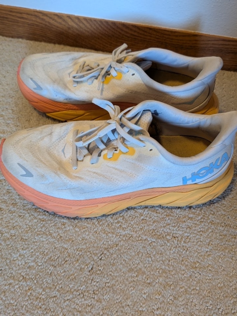 HOKA Arahi 6 Running Shoes in White with Coral & Yellow Accents
